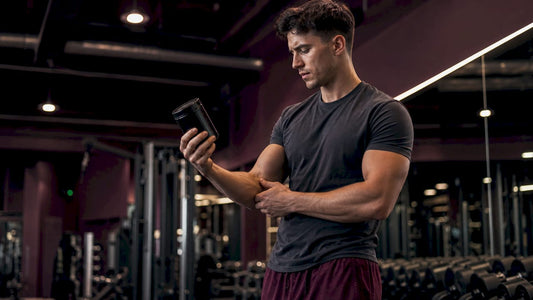 Athlete holding beta alanine supplement experiencing tingling