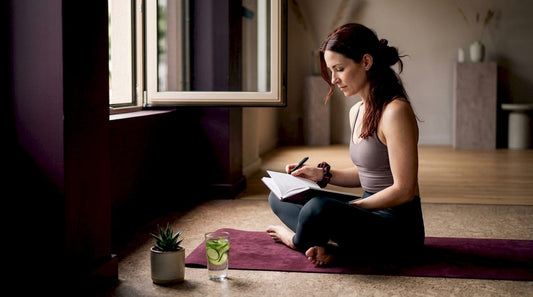 Woman reviewing wellness checklist at home