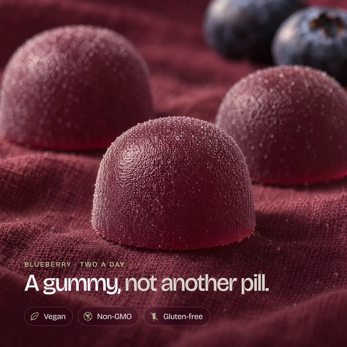 A CP-1 blueberry gummy up close: a gummy, not another pill. Vegan, non-GMO, gluten-free