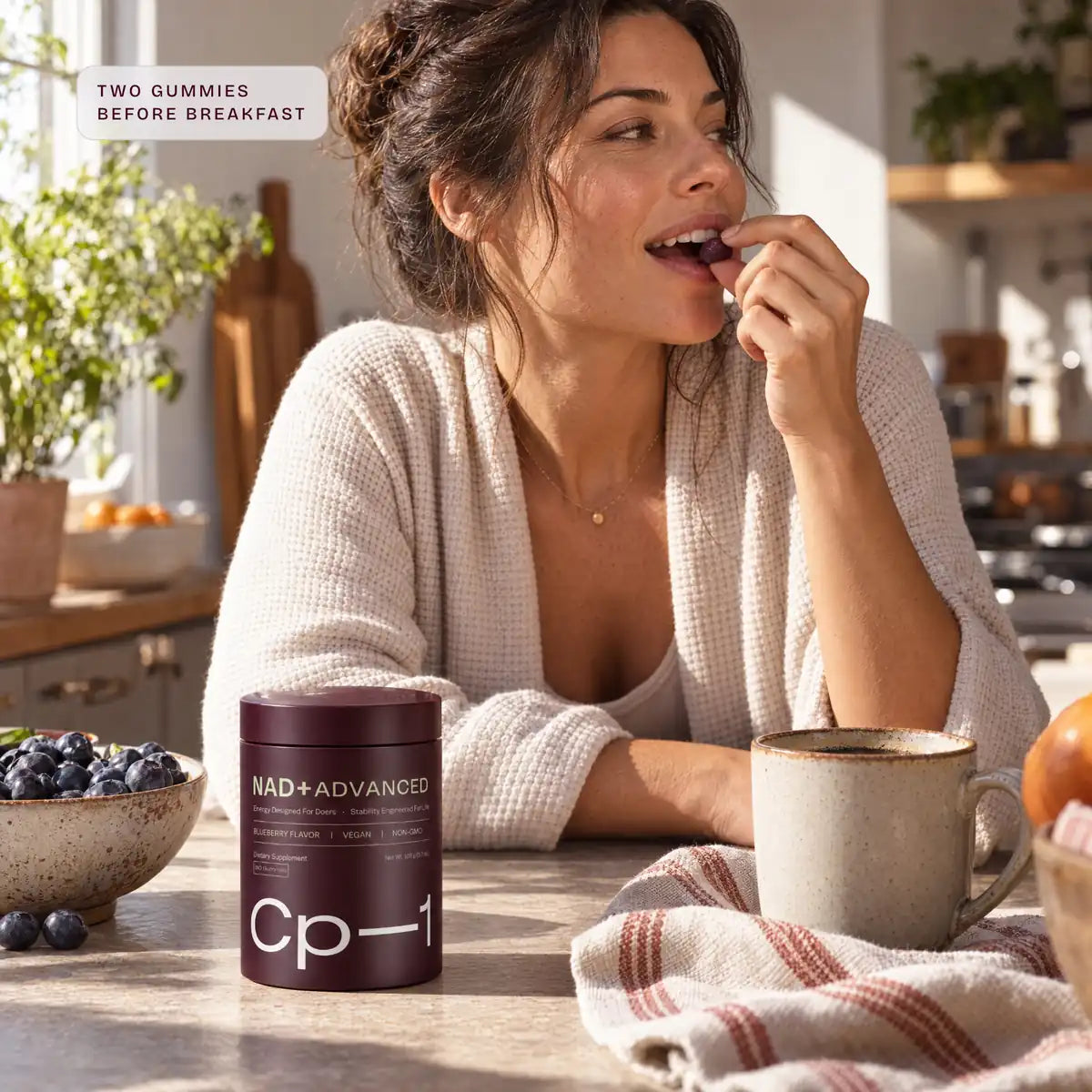 A woman in her kitchen with CP-1: two gummies before breakfast