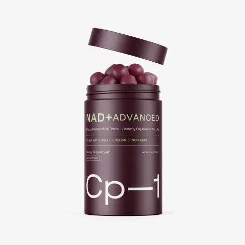 An open CP-1 jar with blueberry gummies